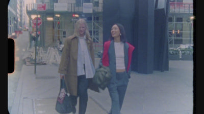 Video with two women walking on the street carrying TYVY totebags.